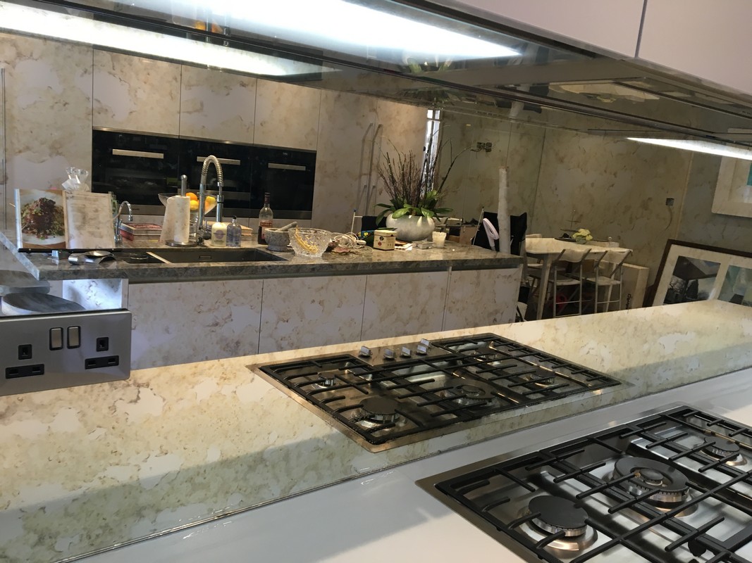 Mirror glass splashback in Fulham luxury kitchen